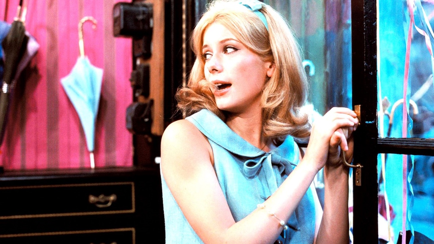 Кадр из фильма «Шербурские зонтики»