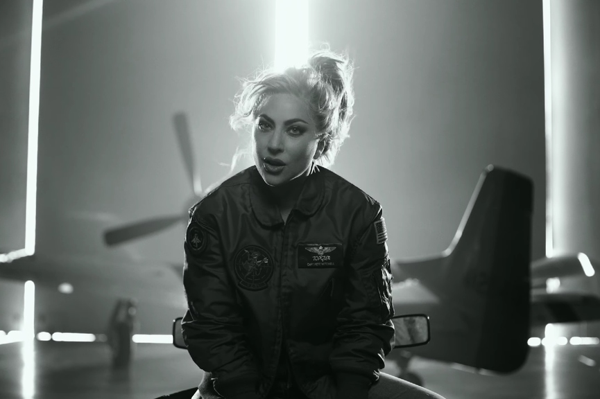 Леди ГагаКадр из клипа ​«Hold My Hand»